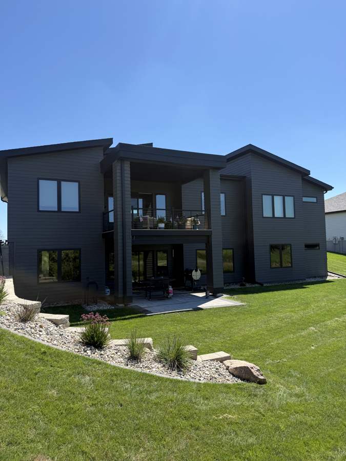 Modern home covered patio and windows