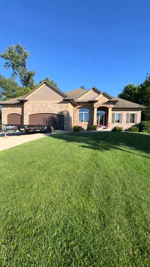 Stone and siding two-story home