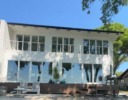 Lakefront home with a wall of windows after cleaning